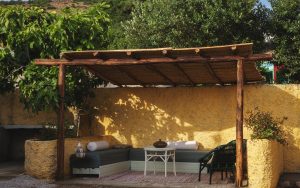 outdoor seating area in rustic moroccan country cottage